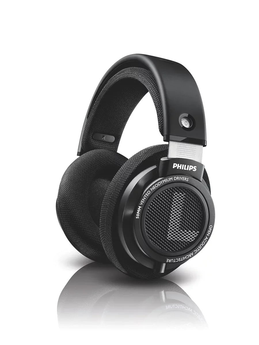 Philips SHP9500 open-back over-ear headphones in black, three-quarter front view on a white background